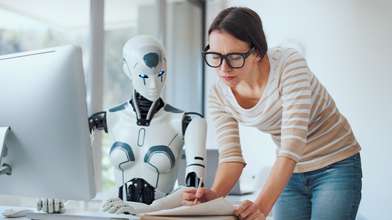 Woman and AI robot working together in the office, automation and technology concept.